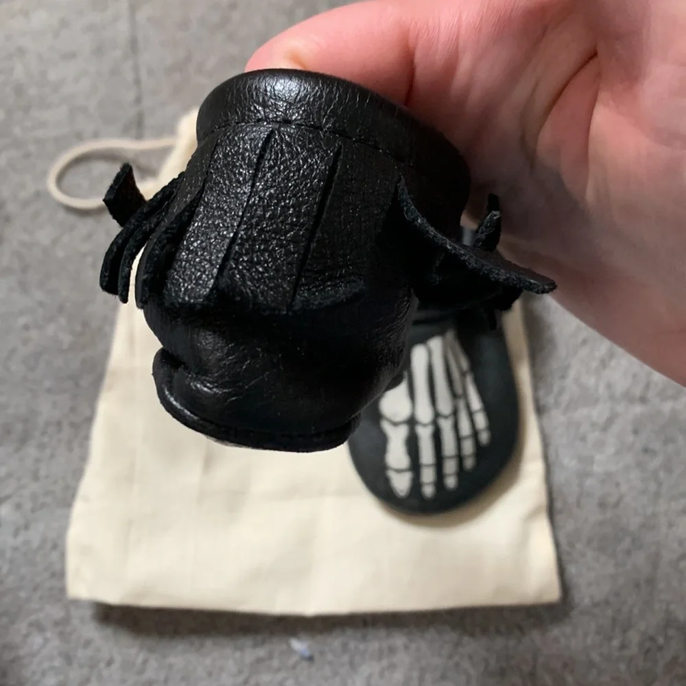 Freshly Picked Black Moccasins with White Skeleton Print